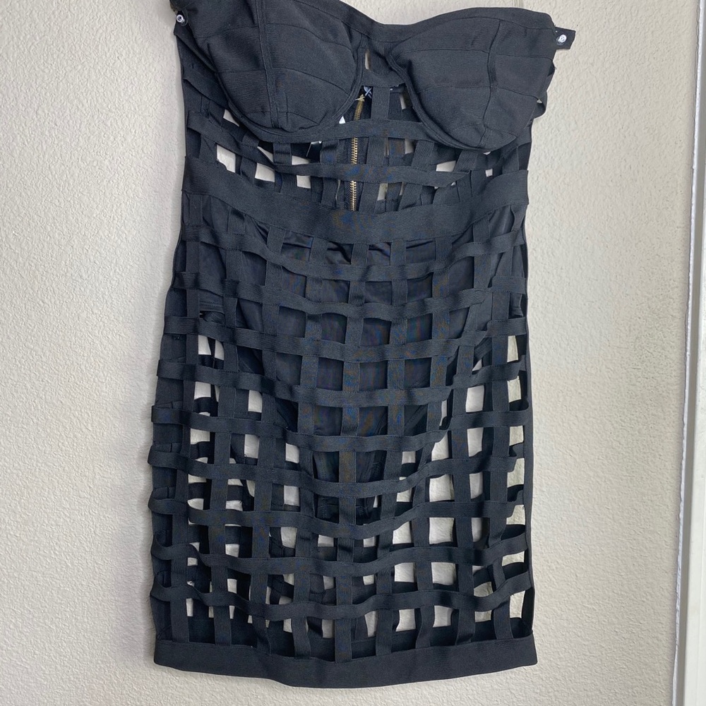 Black cutting edge bandage dress